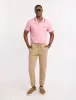 SOLID INTERLOCK POLO SHIRT WITH HIDDEN POCKET sold by U.S. Polo Assn.
