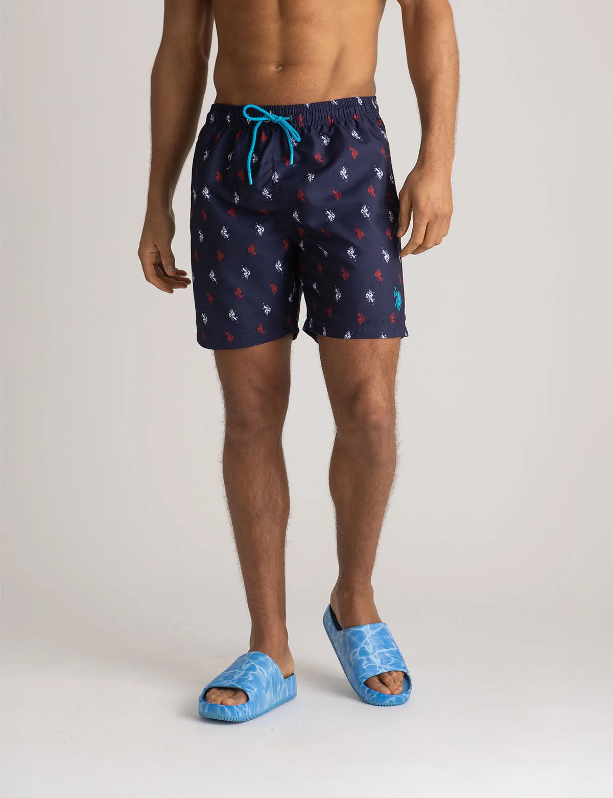7" ALL OVER LOGO SWIM TRUNKS sold by U.S. Polo Assn.
