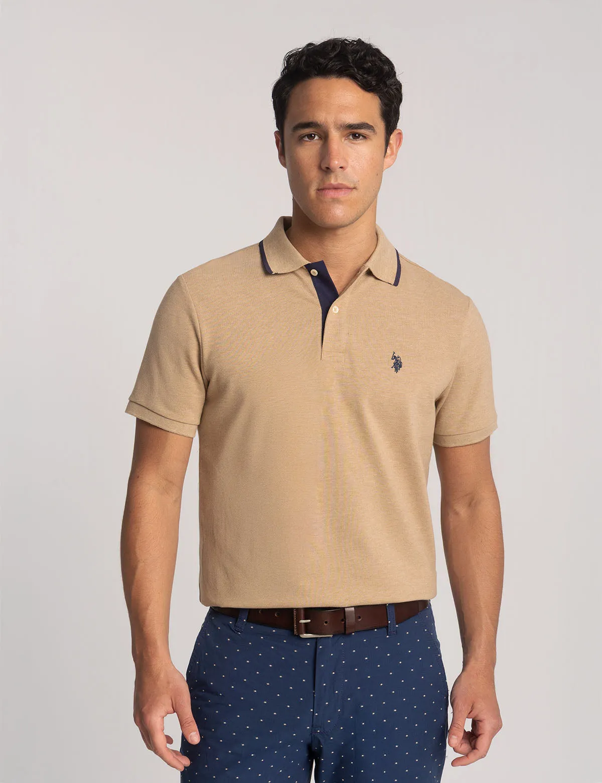 SLIM FIT STRETCH SOLID PIQUE POLO SHIRT sold by U.S. Polo Assn.
