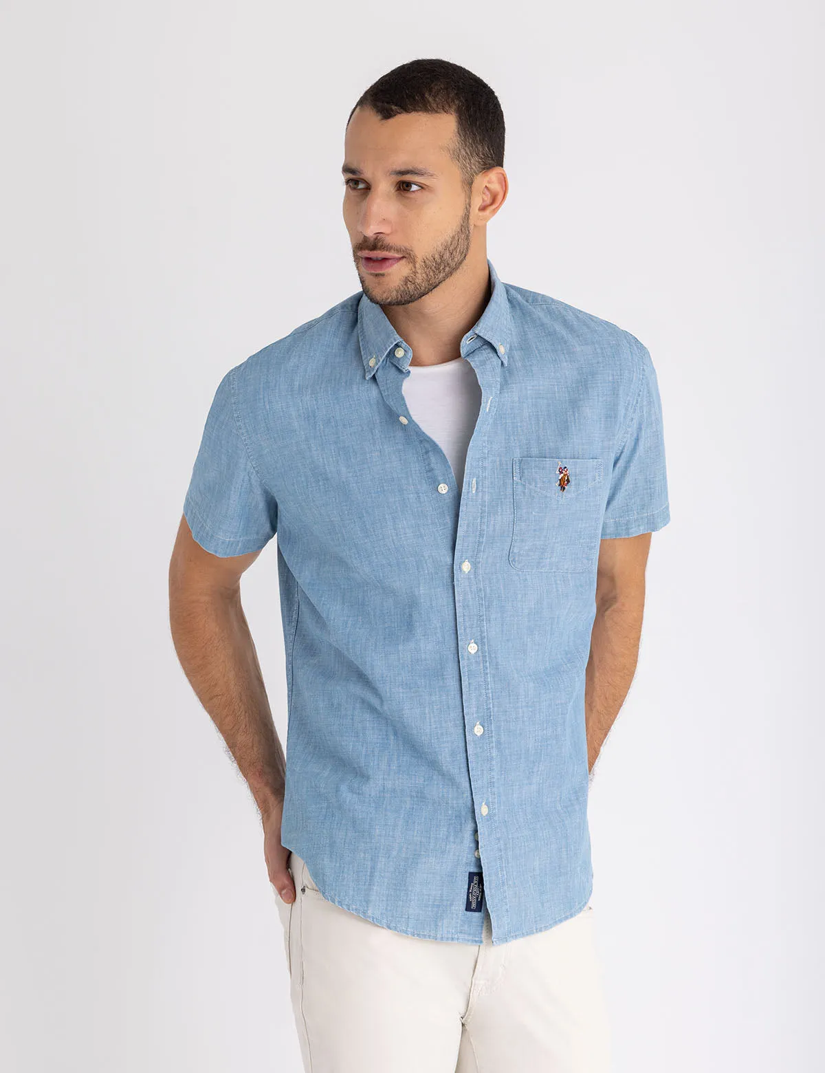 SHORT SLEEVE INDIGO CHAMBRAY SHIRT WITH POCKET sold by U.S. Polo Assn.