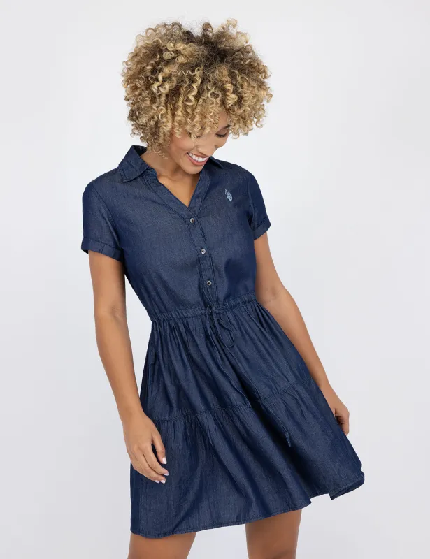 Y PLACKET TIERED DENIM DRESS sold by U.S. Polo Assn.