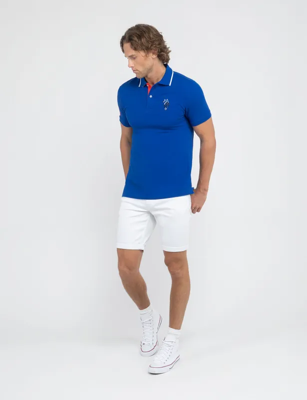 SLIM STRAIGHT 5 POCKET CUFFED DENIM SHORT sold by U.S. Polo Assn.