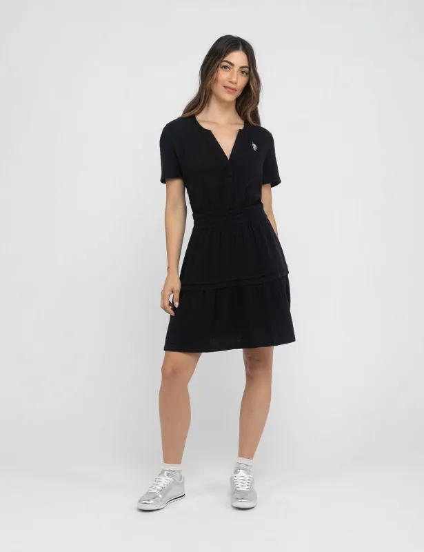 SMOCKED WAIST TIERED DRESS sold by U.S. Polo Assn.