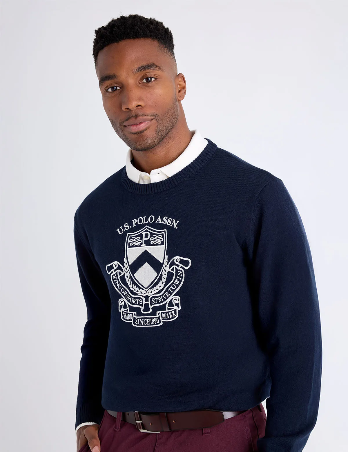 EMBROIDERED CREST CREW NECK SWEATER sold by U.S. Polo Assn.