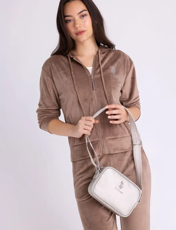 CLASSIC ZIP METALLIC CROSSBODY BAG sold by U.S. Polo Assn.