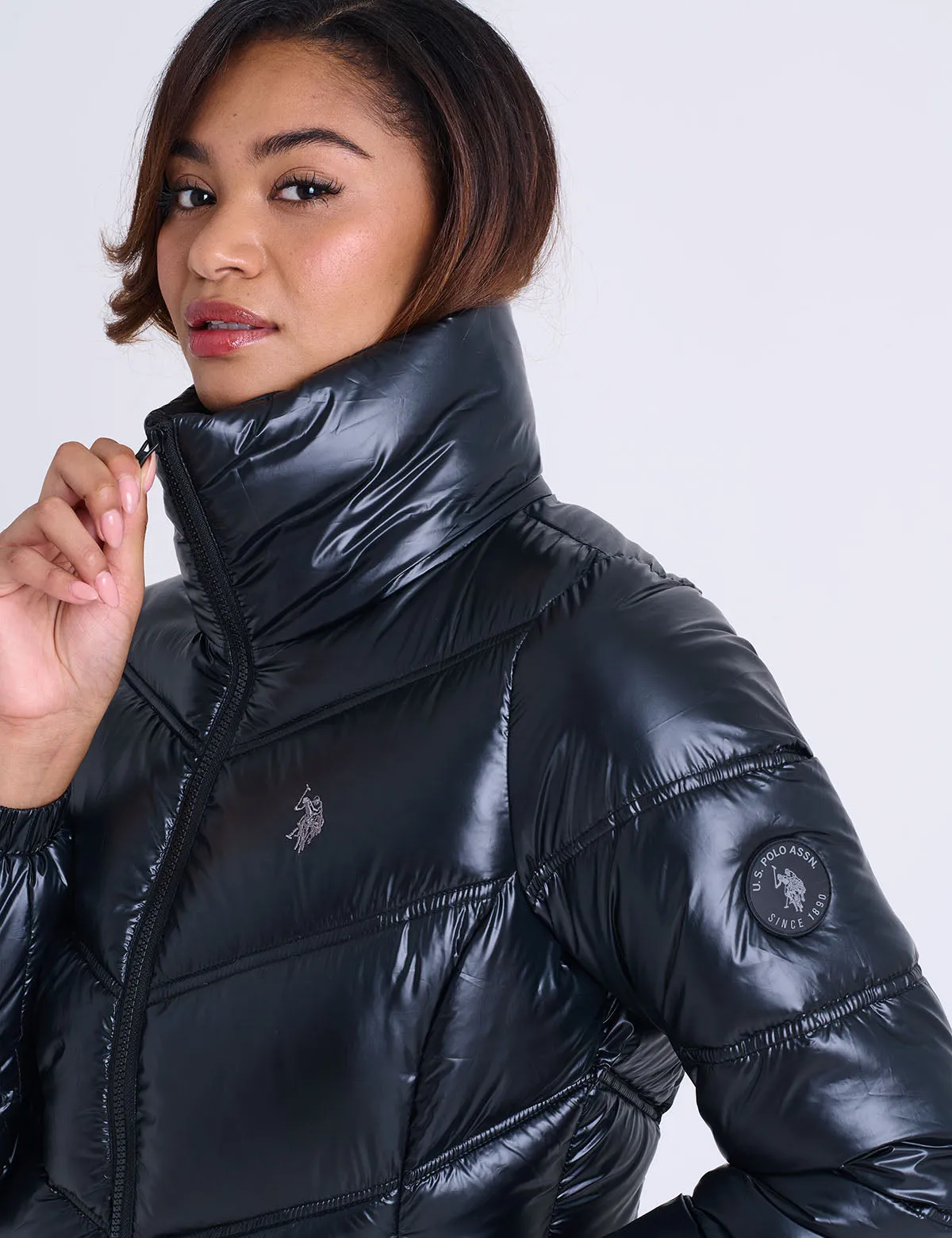 SHINY CHEVRON QUILTED PUFFER JACKET sold by U.S. Polo Assn.