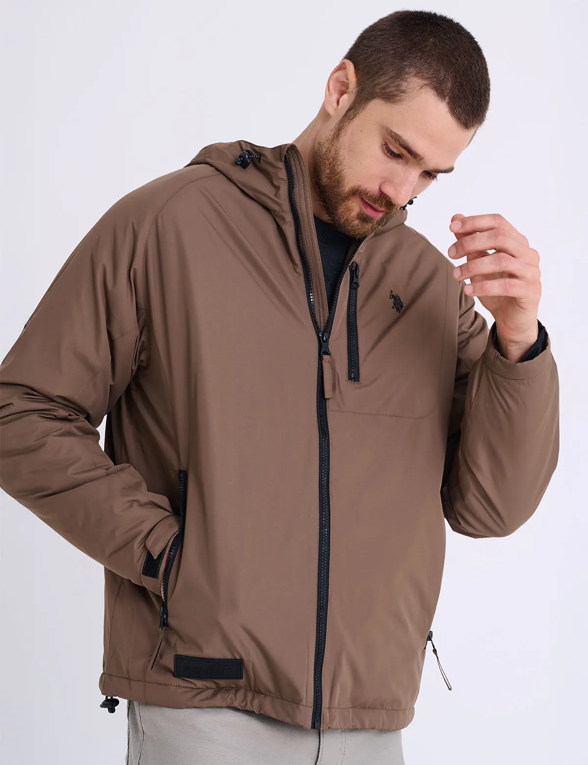 HOODED SPORT TECH JACKET sold by U.S. Polo Assn.