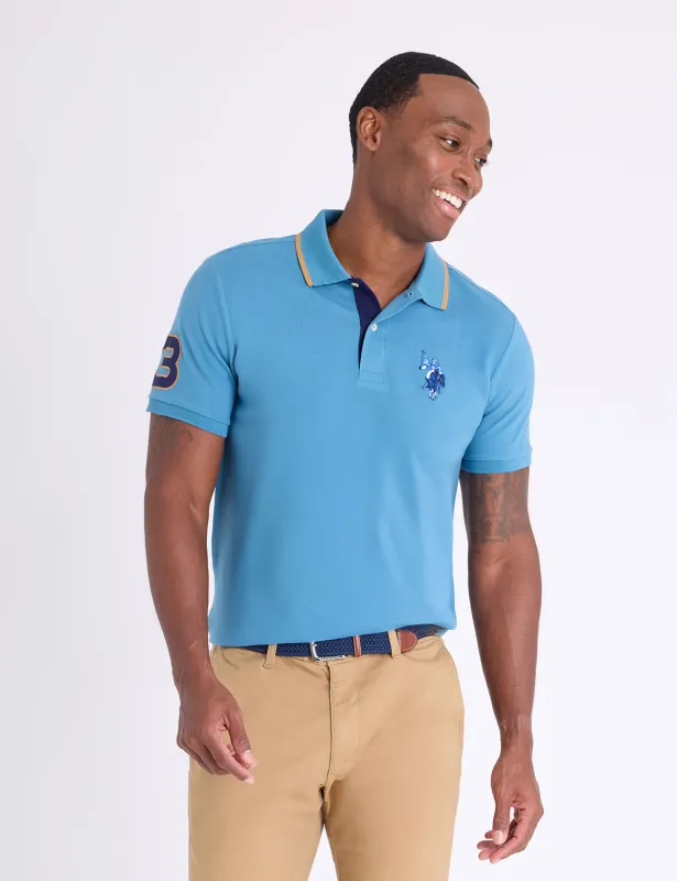 SLIM FIT BIG LOGO MULTI-TONAL POLO SHIRT sold by U.S. Polo Assn.