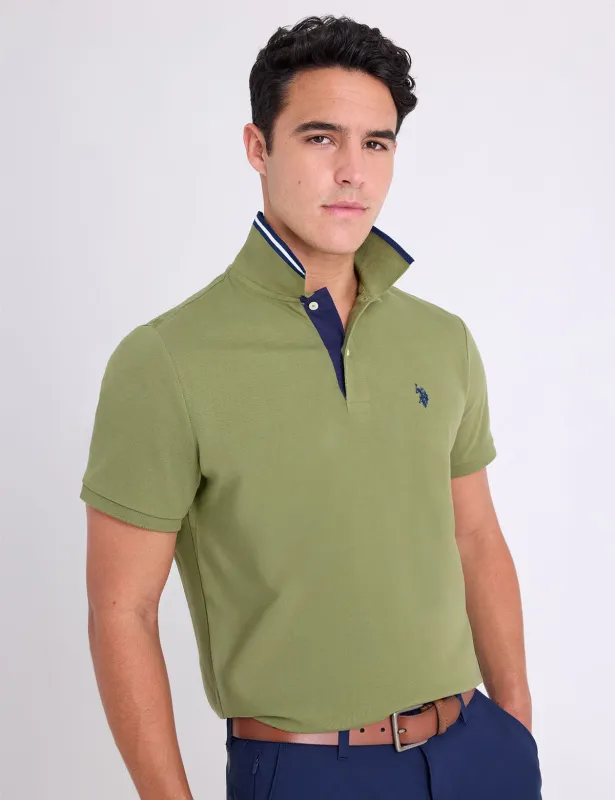 SLIM FIT STRETCH SOLID PIQUE POLO SHIRT sold by U.S. Polo Assn.