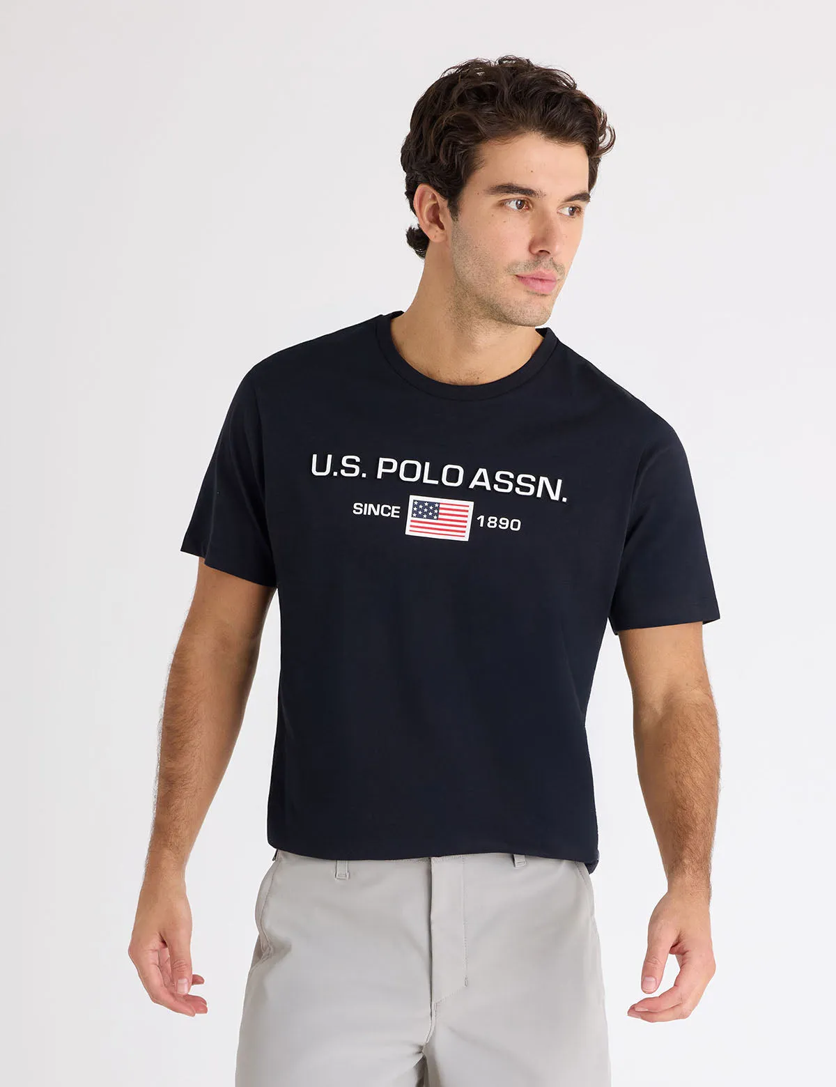 FLAG EMBOSSED WORDMARK PRINTED JERSEY T-SHIRT sold by U.S. Polo Assn.