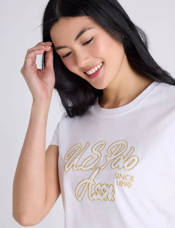 SATEEN LUREX SCRIPT SEMI SCOOP T-SHIRT sold by U.S. Polo Assn.