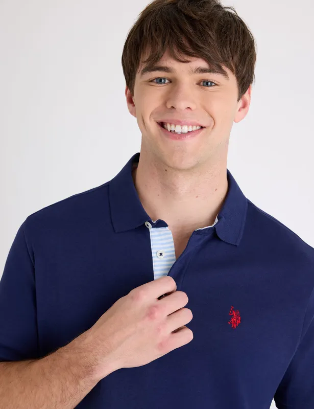 SOLID INTERLOCK POLO SHIRT WITH STRIPE TRIM made by U.S. Polo Assn.