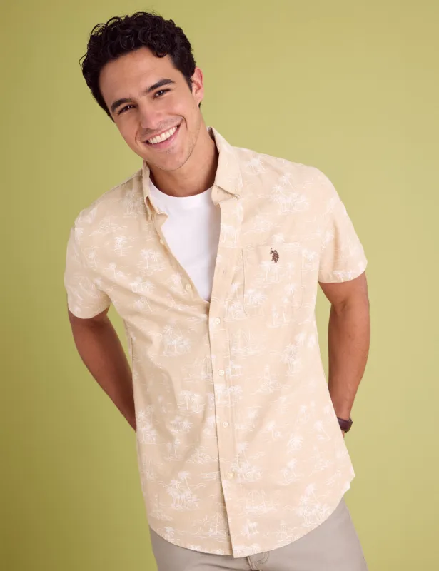 SHORT SLEEVE SLUB CHAMBRAY PALM PRINT SHIRT made by U.S. Polo Assn.