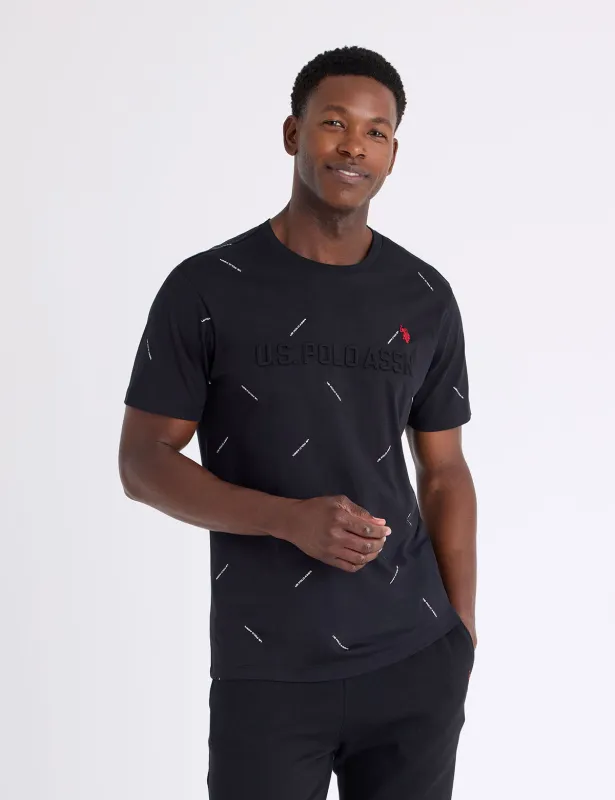 ALLOVER PRINT WORDMARK EMBOSSED T-SHIRT made by U.S. Polo Assn.