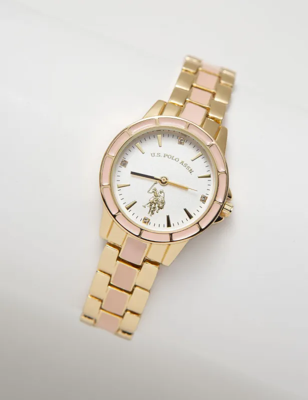 Ladies Goldtone and Pink Enamel Bracelet Watch sold by U.S. Polo Assn.