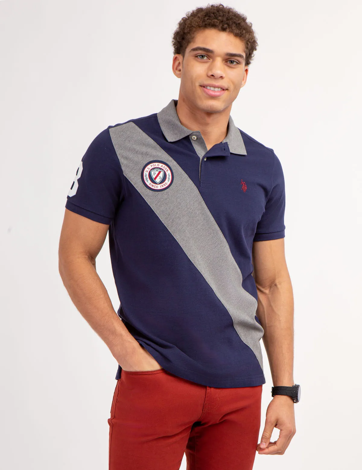 COLORBLOCK PIQUE SASH POLO SHIRT sold by U.S. Polo Assn.