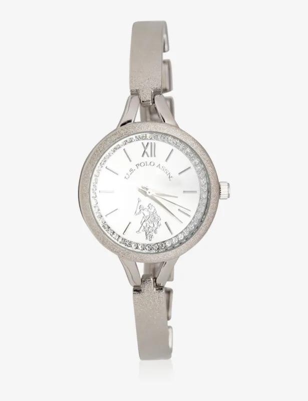 USPA WOMEN'S SILVER & RHINESTONE STUDDED WATCH sold by U.S. Polo Assn.