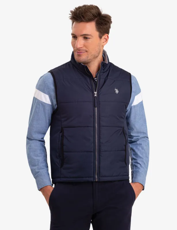 LIGHT PUFFER LAYERING VEST sold by U.S. Polo Assn.