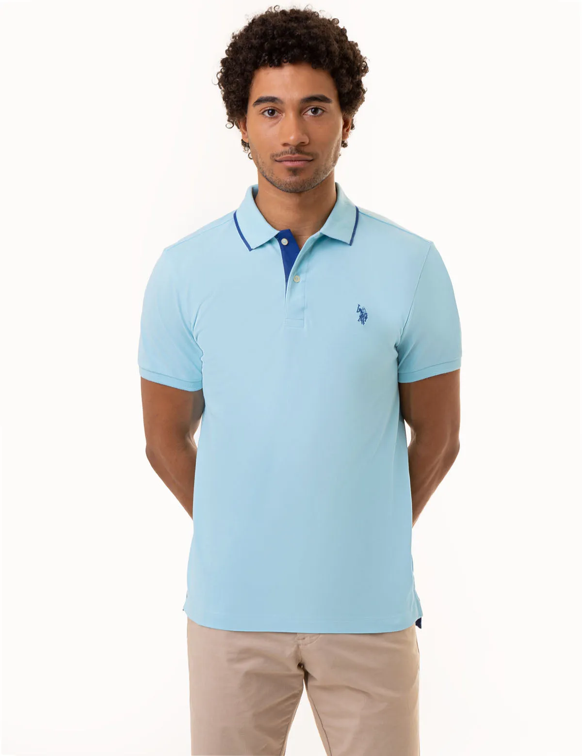 SLIM FIT STRETCH PIQUE SOLID POLO SHIRT sold by U.S. Polo Assn.