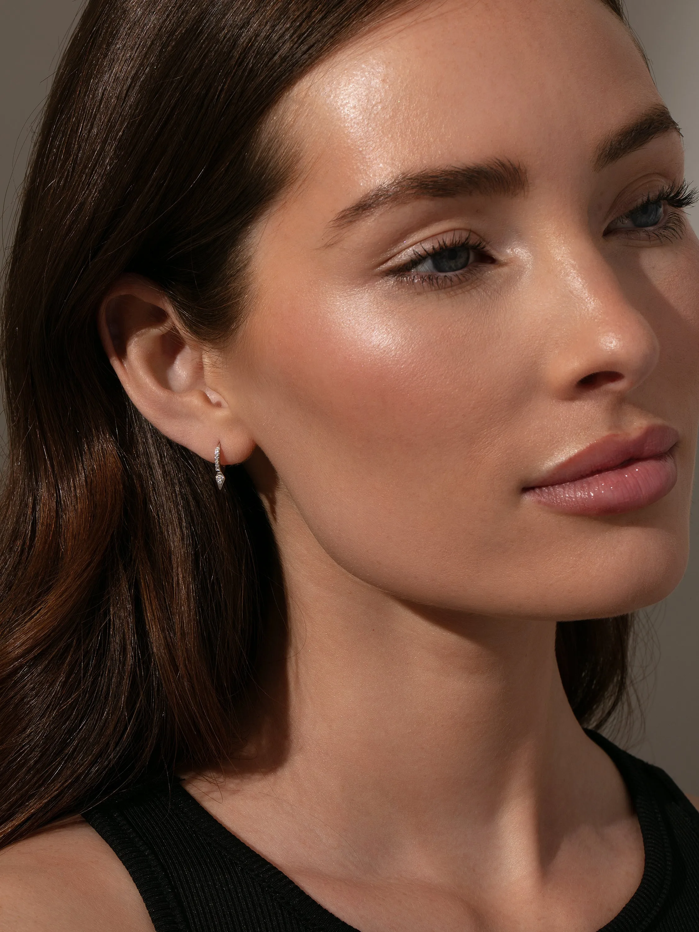 Tipping Point Pavé Huggie Earrings sold by Uncommon James product image thumbnail 2