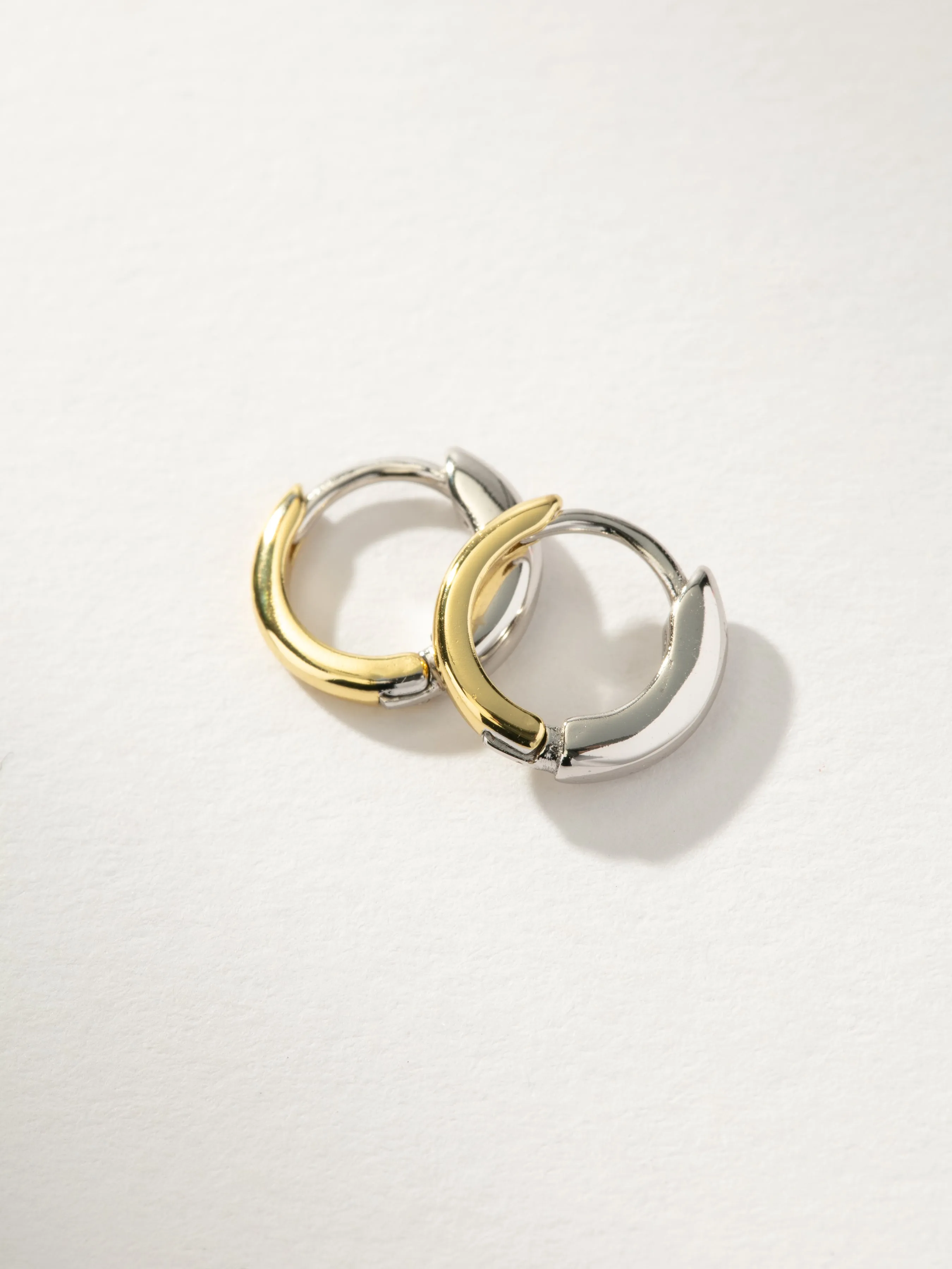 Mixed Metal Huggie Earrings sold by Uncommon James