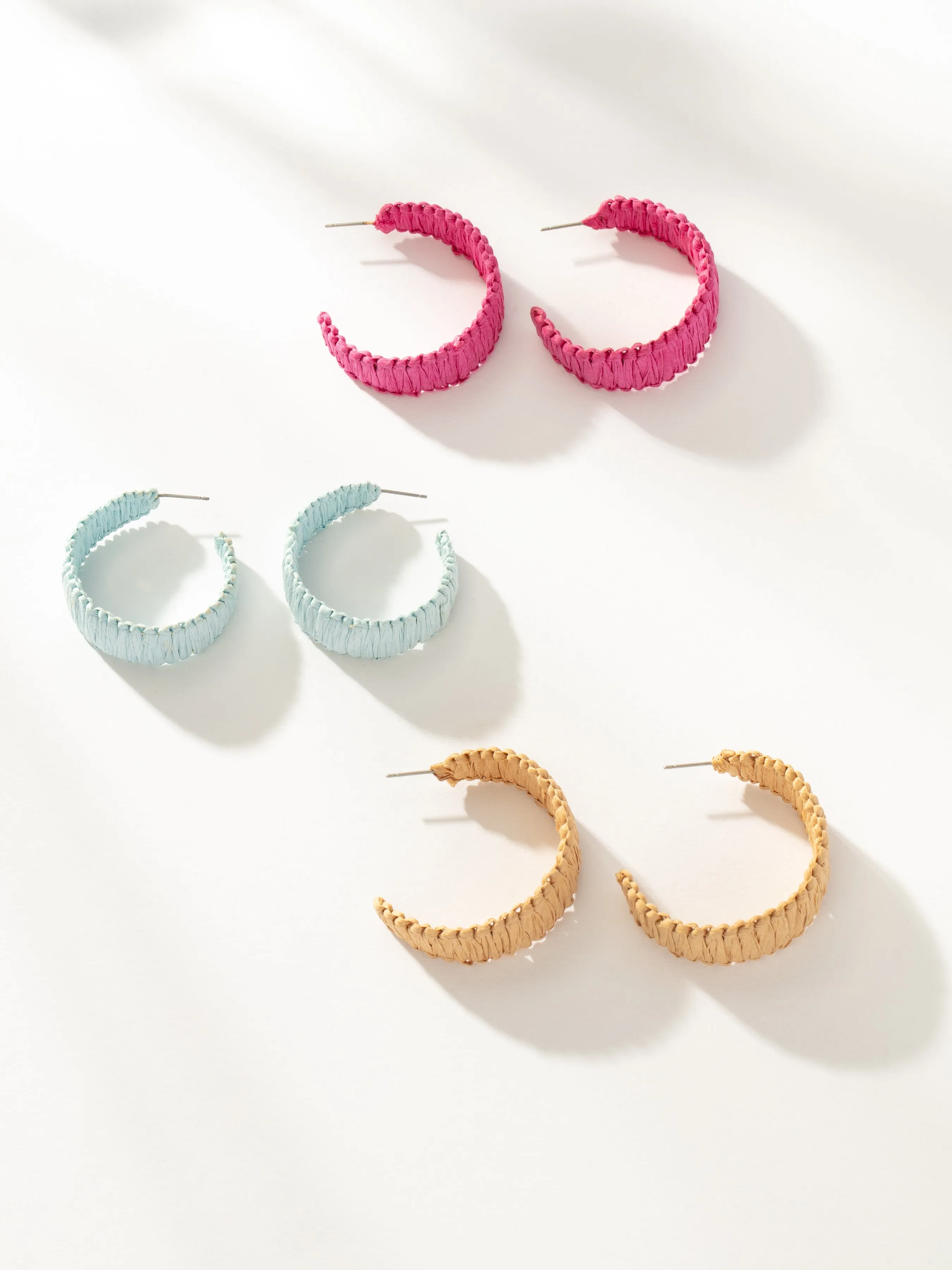 Raffia Woven Hoop Earrings sold by Uncommon James