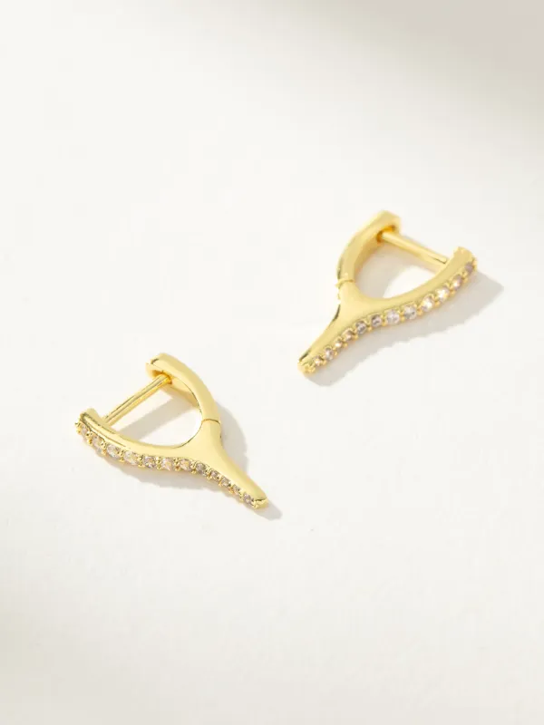 Wishbone Pavé Huggie Earrings sold by Uncommon James
