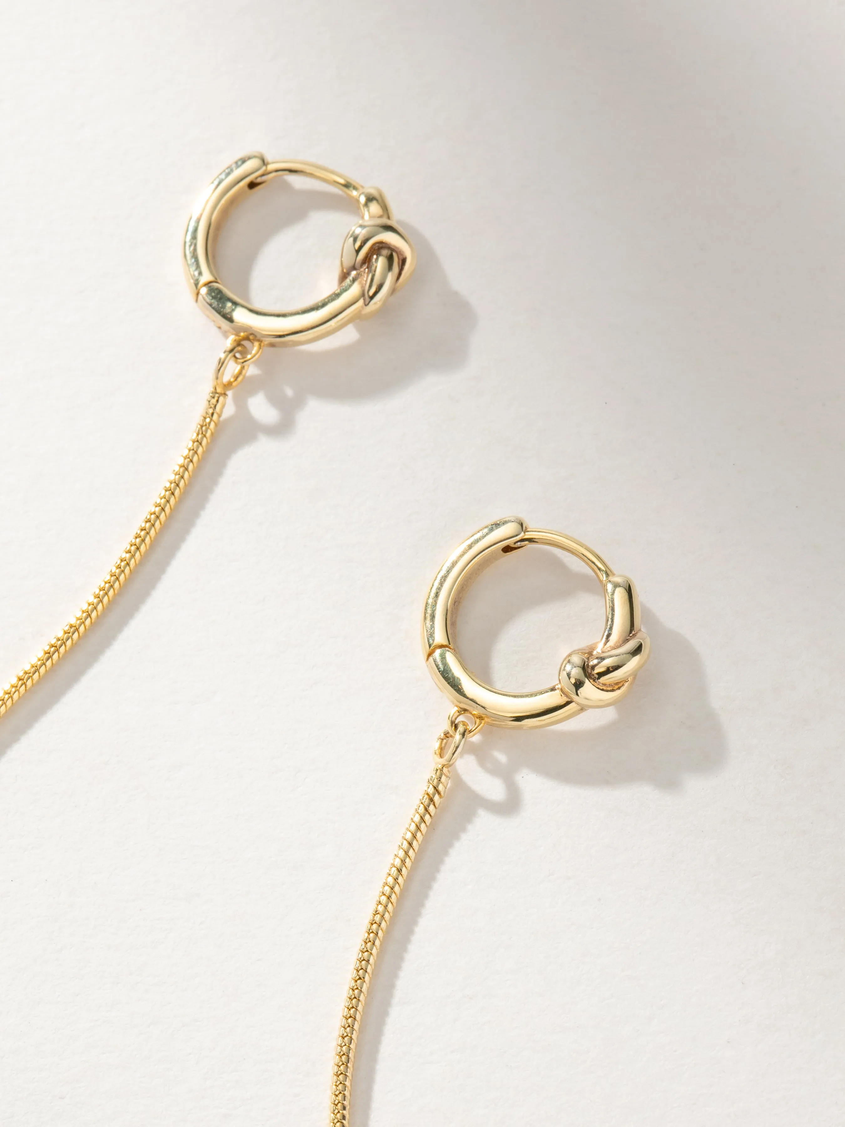 Forever Knot and Chain Huggie Earrings sold by Uncommon James product image thumbnail 4