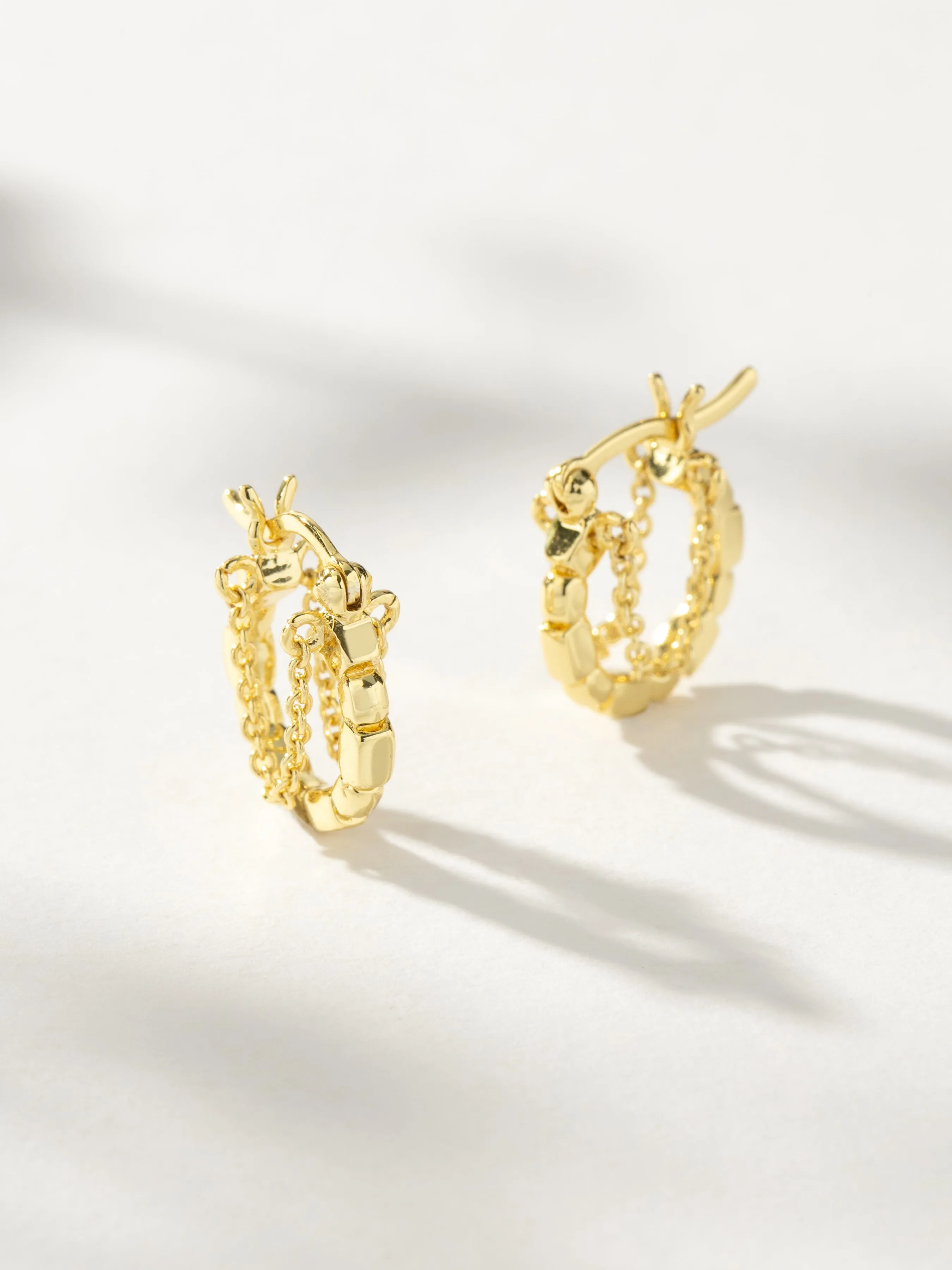 Risk Chain Huggie Earrings sold by Uncommon James