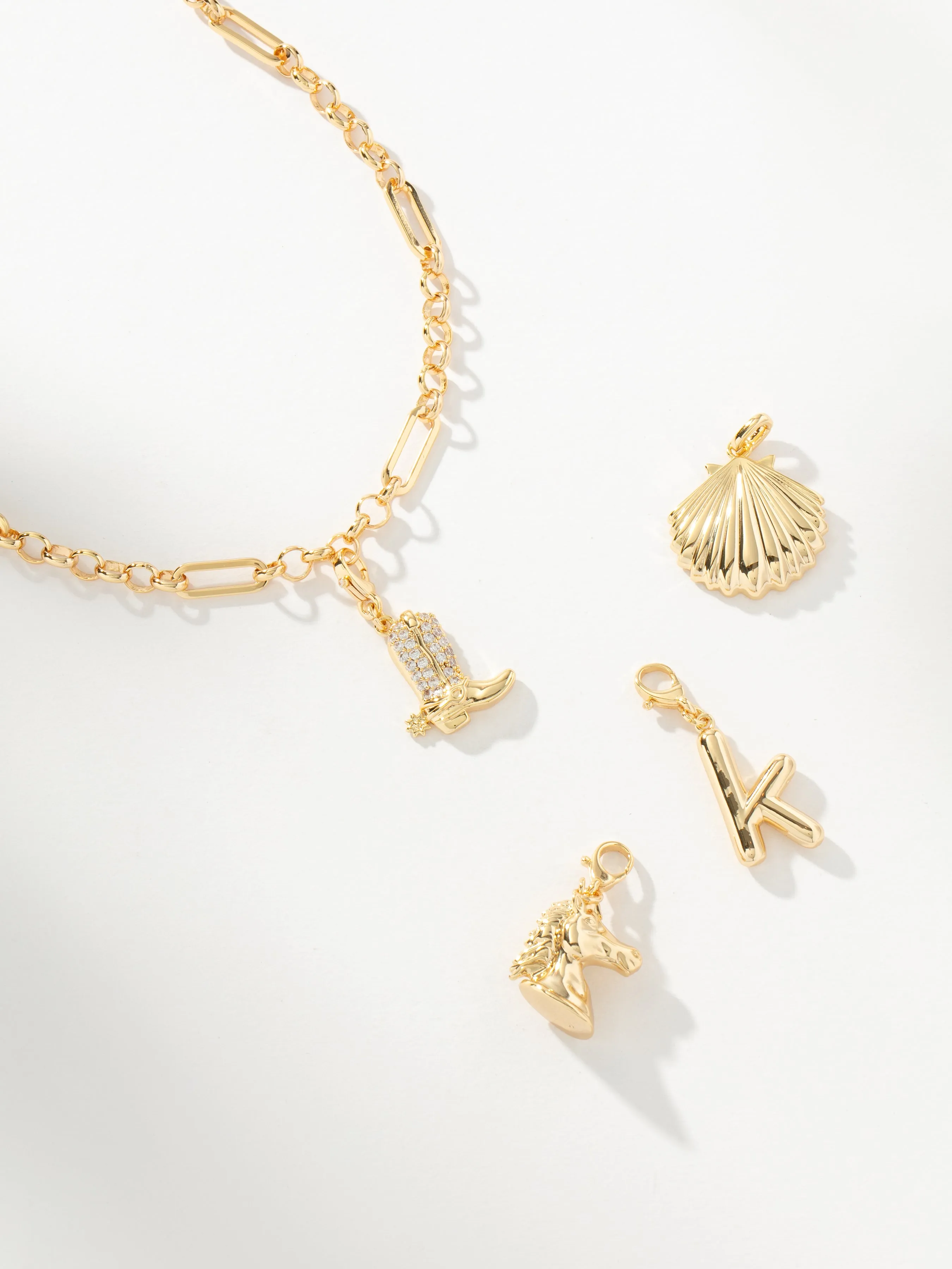 The Loop Charm Collector Necklace sold by Uncommon James