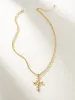 Bubble Cross Necklace sold by Uncommon James