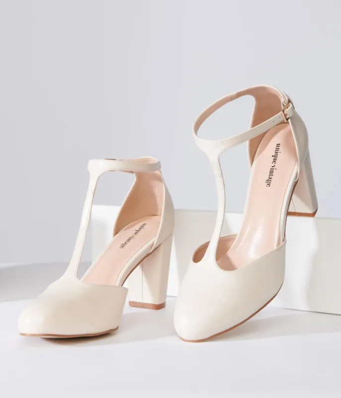 Unique Vintage 1920s Beige Leatherette T-Strap Astaire Pumps sold by Unique Vintage