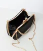 Black & Gold Textured Clutch Hand Bag sold by Unique Vintage