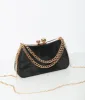 Black & Gold Textured Clutch Hand Bag sold by Unique Vintage