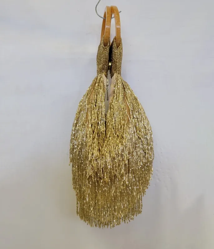 1920s Gold Beaded Fringe Wristlet sold by Unique Vintage