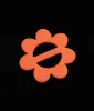 Miracle Eye 1960s Orange Daisy Scarf Slide sold by Unique Vintage