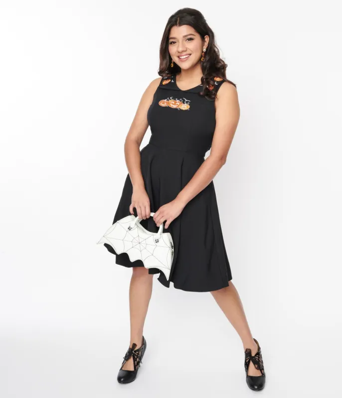 Black & Pumpkin Embroidered Flare Dress sold by Unique Vintage