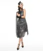 Unique Vintage 1920s Black & Silver Sequin Spider Web Draped Flapper Dress sold by Unique Vintage