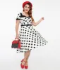 Unique Vintage 1950s White & Black Polka Dot Swing Dress sold by Unique Vintage