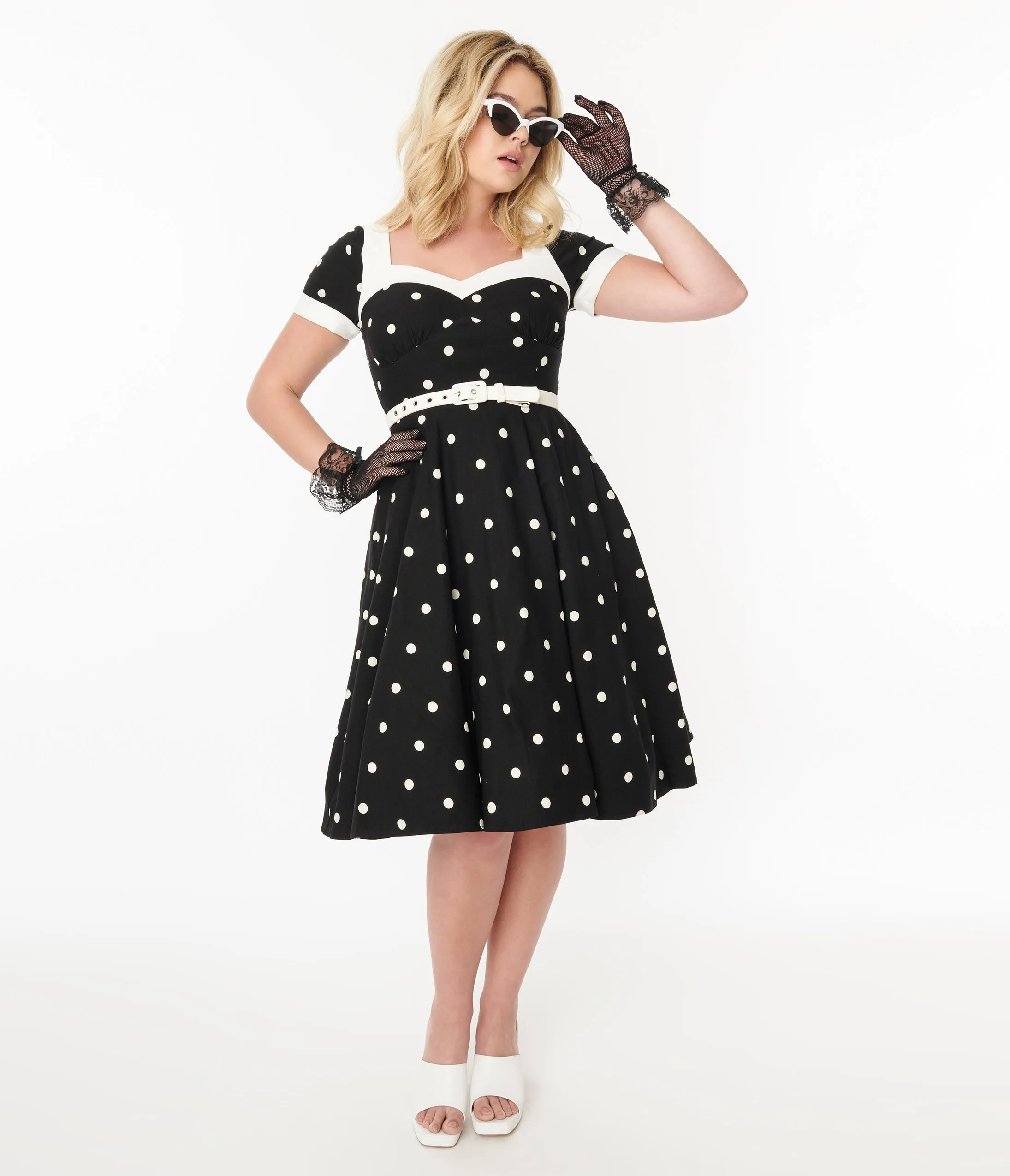 Unique Vintage 1950s Black & White Polka Dot Swing Dress sold by Unique Vintage