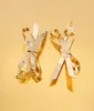 Gold Bow Drop Earrings sold by Unique Vintage