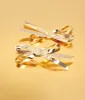 Gold Bow Drop Earrings sold by Unique Vintage