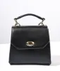 Black Leatherette Mini Handbag sold by Unique Vintage