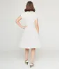 Ivory & Black Polka Dot Flare Dress sold by Unique Vintage