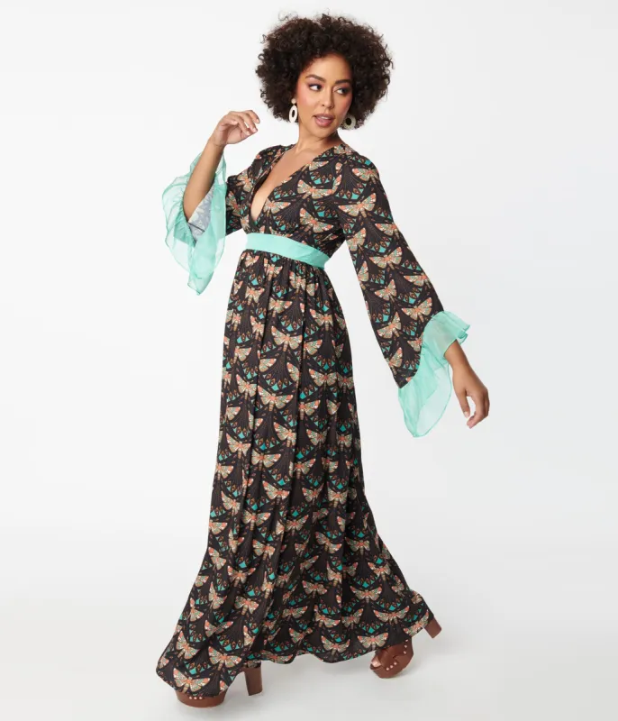 Unique Vintage 1970s Black & Mint Moth Print Maxi Dress sold by Unique Vintage