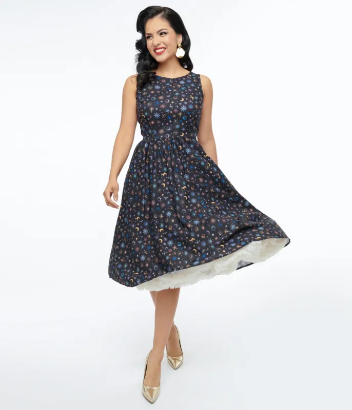 Retrolicious 1950s Black Celestial Stars & Moon Print Midi Dress sold by Unique Vintage
