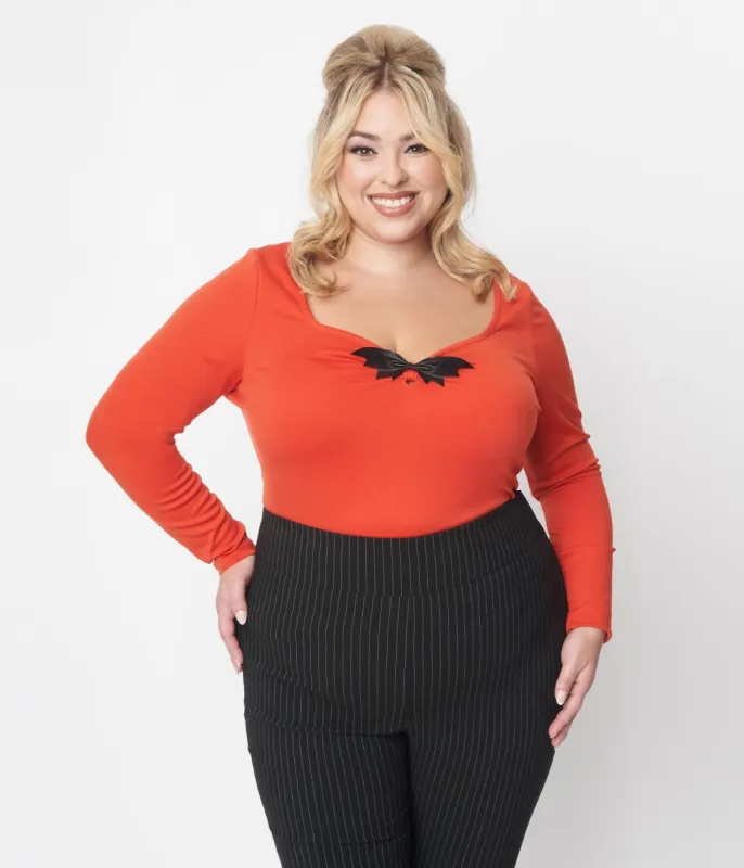 Unique Vintage Orange & Black Bat Bow Long Sleeve Top sold by Unique Vintage