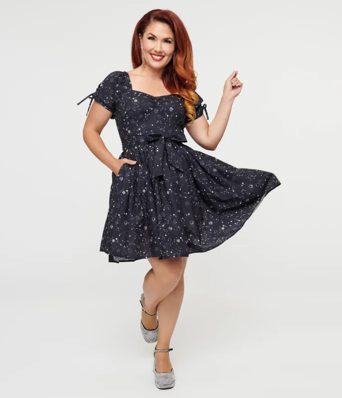 Unique Vintage 1950s Navy Cosmos Print Swing Dress sold by Unique Vintage
