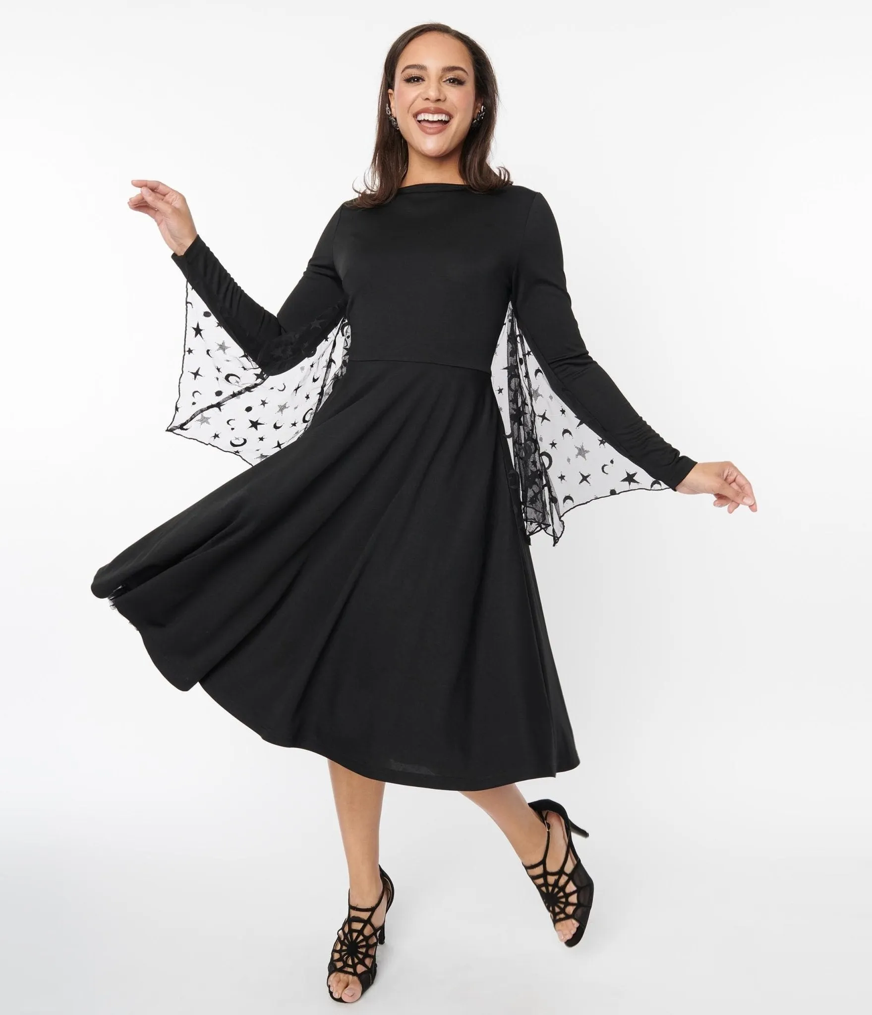 Unique Vintage Black & Mesh Bat Swing Dress sold by Unique Vintage