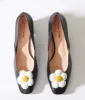 Unique Vintage Black Daisy Pumps sold by Unique Vintage